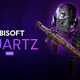 An edgelord's mask, a fancy gun, and a pair of pants float in a purple void next to the Ubisoft Quartz logo.
